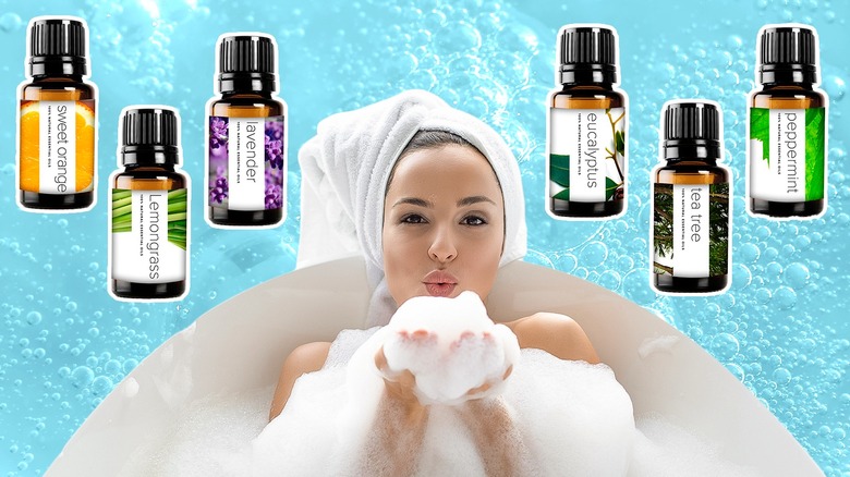 Woman relaxes in bathtub with essential oils