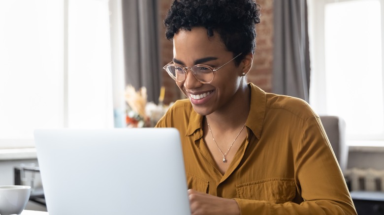 Woman smiling computer work