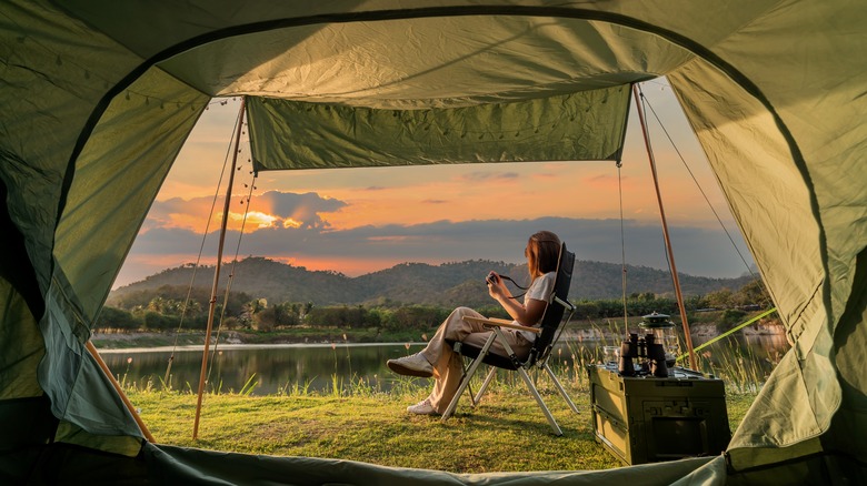 Woman sitting on camping site