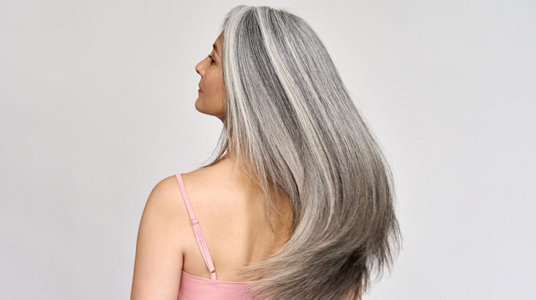 Woman with long gray hair