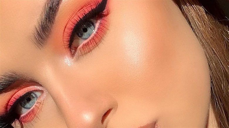 Woman wearing peach makeup