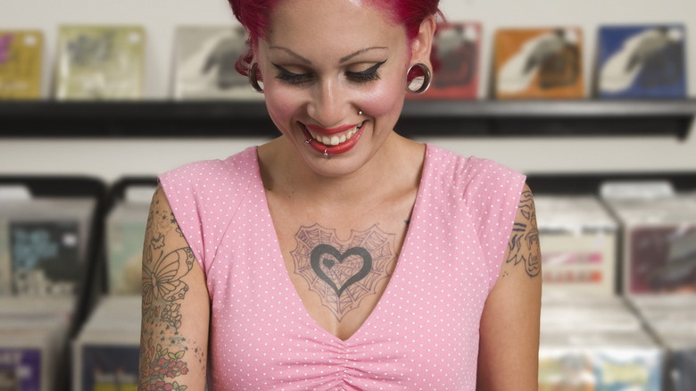 Woman with many tattoos