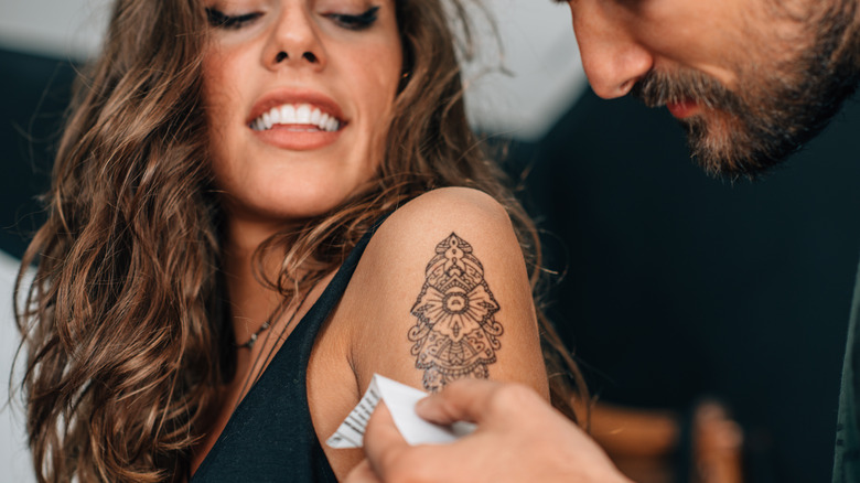 Woman with an ornamental tattoo
