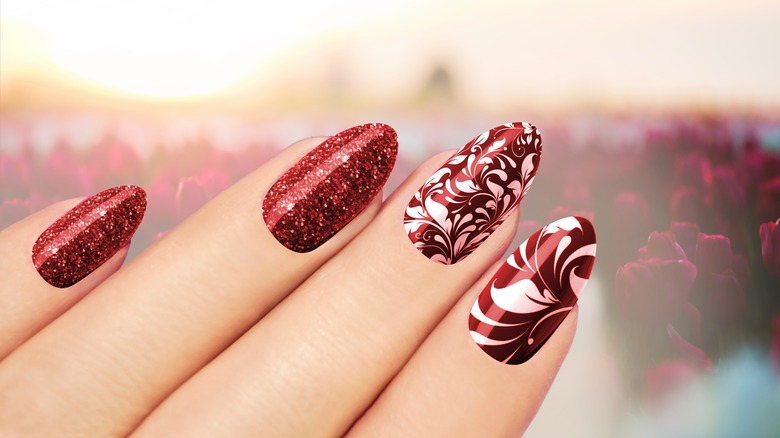 Red glitter and floral nails