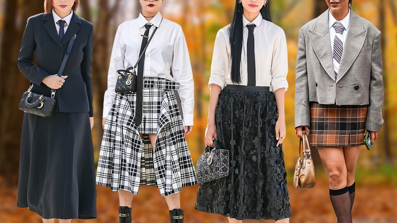 Four women wearing school uniform look