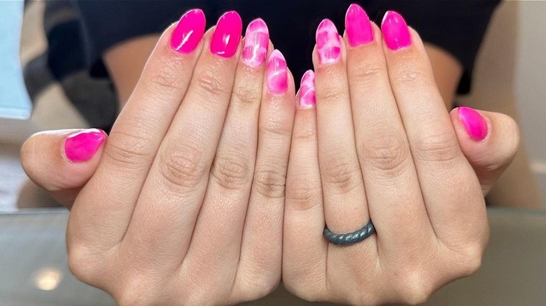 Pink manicure with tie-dye nails 