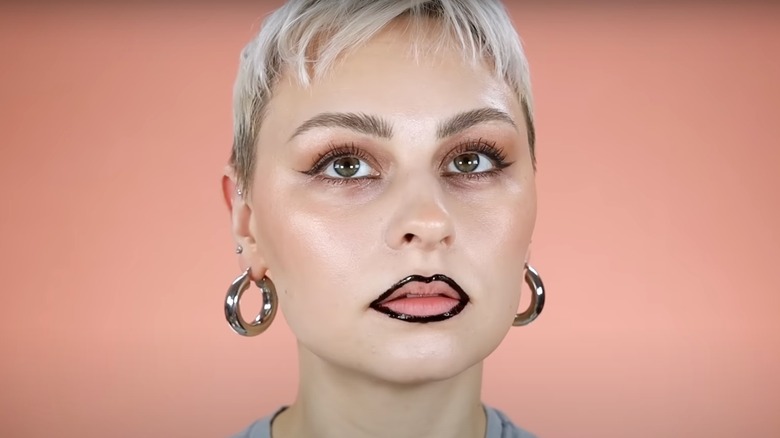 Woman wearing peel-off lip liner