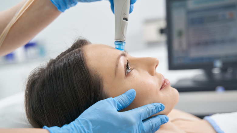 close up of woman getting hydrafacial