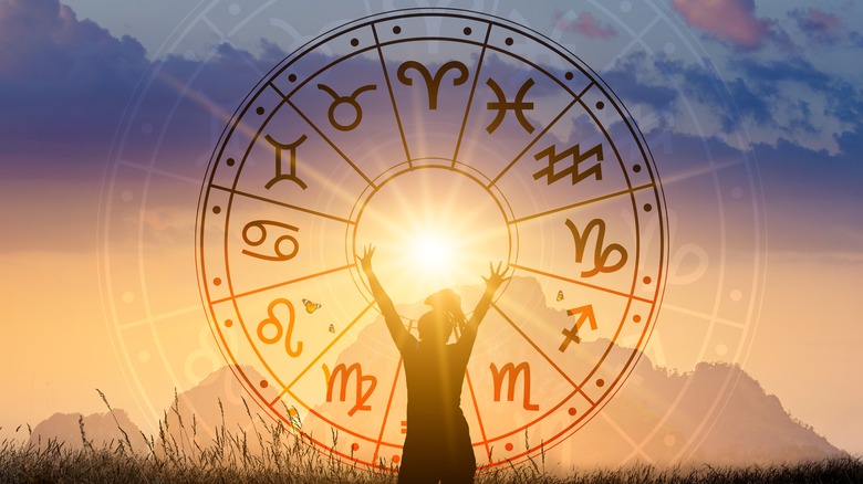 woman with zodiac symbols